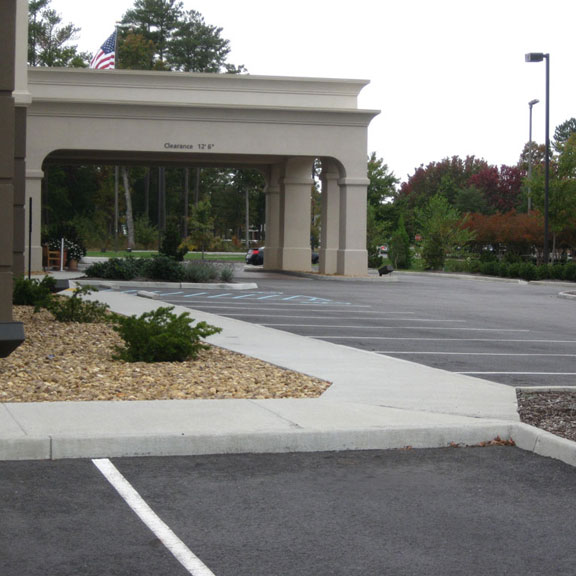 Parking lot and sidewalk detail of Hampton Inn