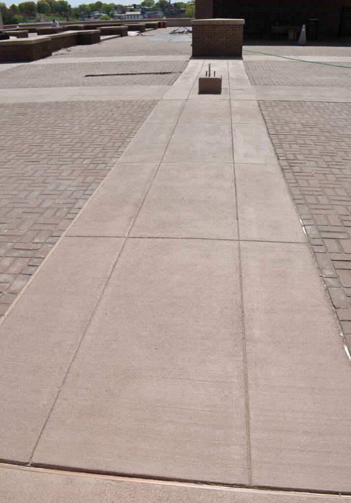 Closeup of concrete overlays with colored epoxy coatings
