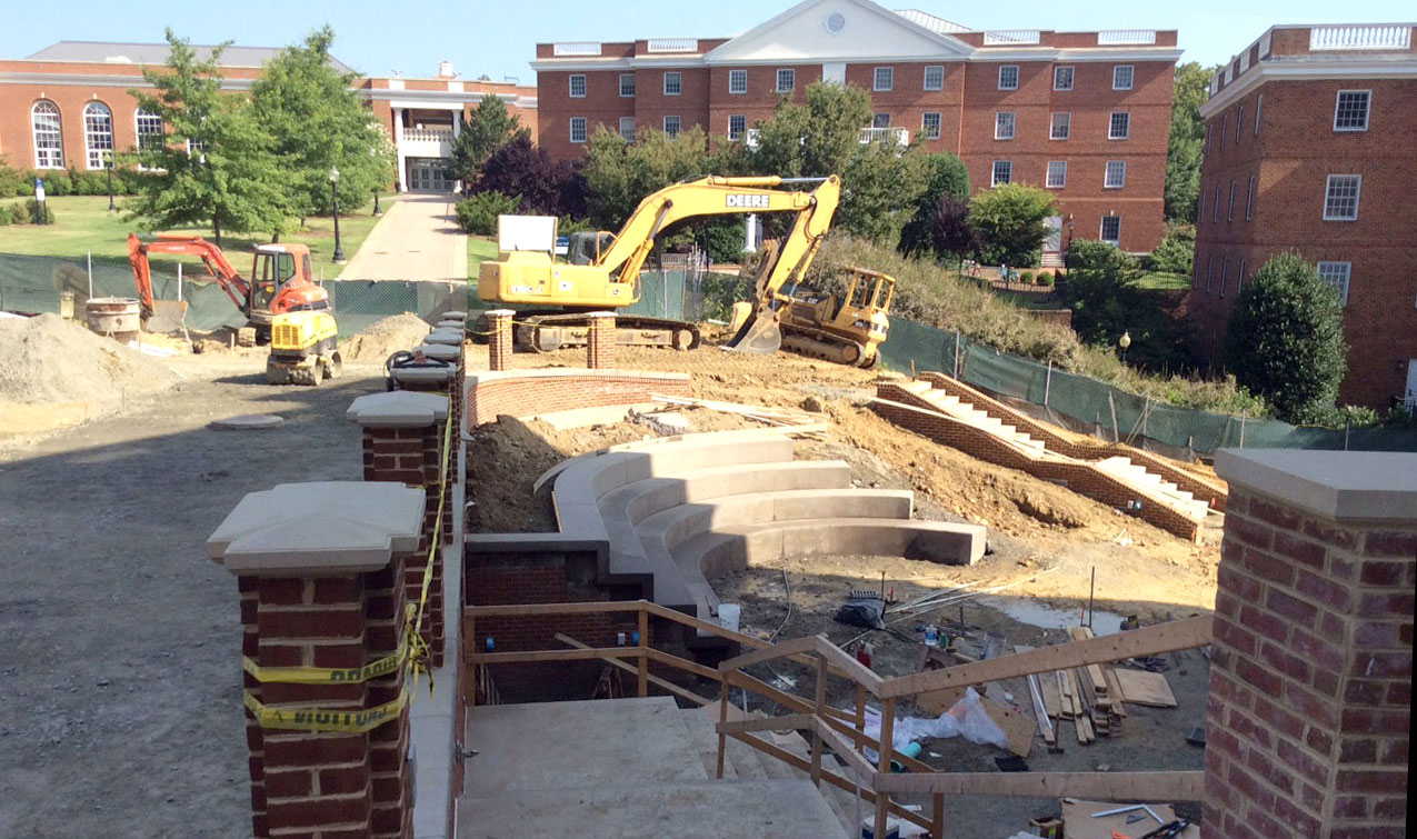 Overhead view of special radius concrete seating with heavy equipment